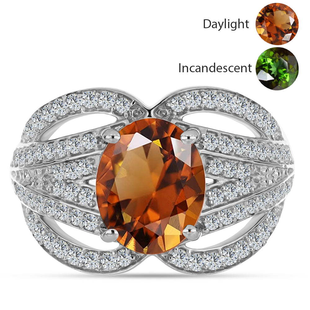 Silberring mit zertifiziertem laborgezüchteten Zultanit aus Anatolien und weißem Topas