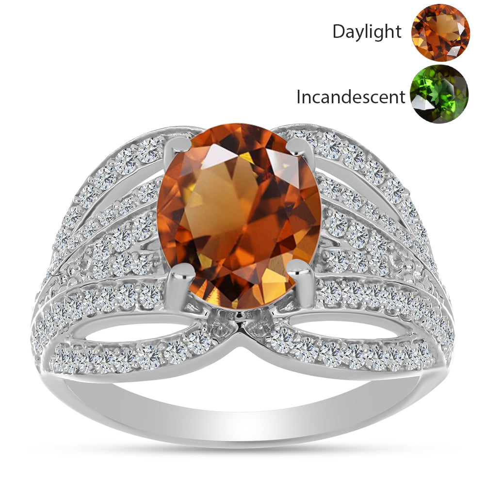 Silberring mit zertifiziertem laborgezüchteten Zultanit aus Anatolien und weißem Topas