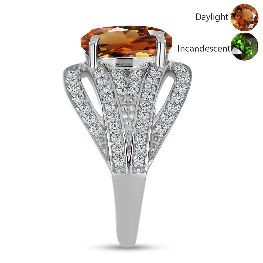 Silberring mit zertifiziertem laborgezüchteten Zultanit aus Anatolien und weißem Topas