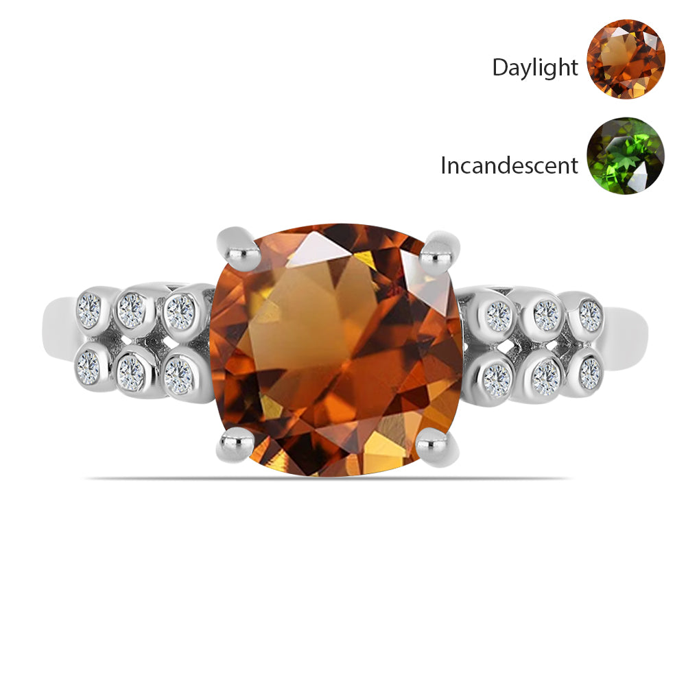 Silberring mit zertifiziertem laborgezüchteten Zultanit aus Anatolien und weißem Topas 1 