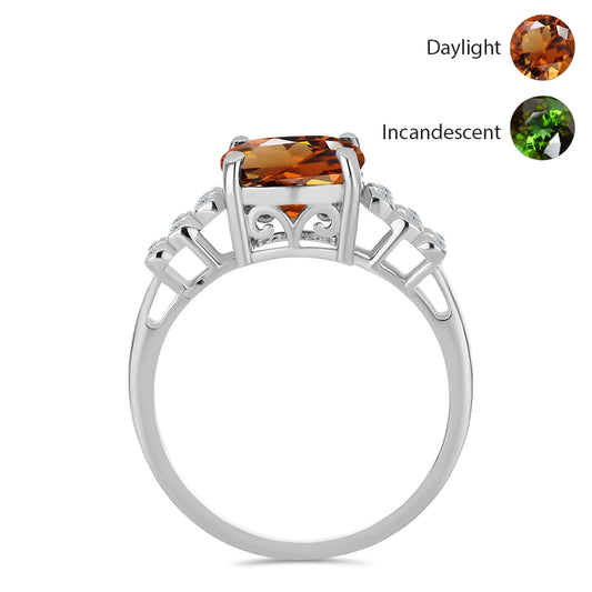 Silberring mit zertifiziertem laborgezüchteten Zultanit aus Anatolien und weißem Topas