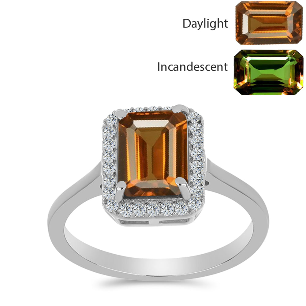 Silberring mit zertifiziertem laborgezüchteten Zultanit aus Anatolien und weißem Topas