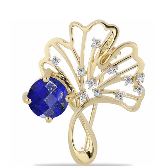 Goldplattierte Silberbrosche mit Lapislazuli und weißem Topas