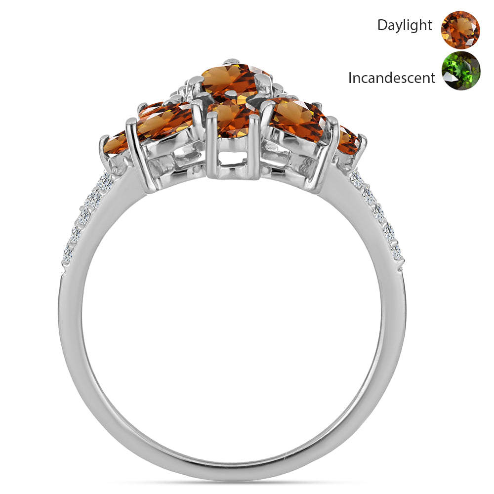 Silberring mit zertifiziertem laborgezüchteten Zultanit aus Anatolien und weißem Topas 2 