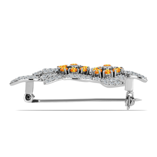 Silberbrosche mit Padparadscha Saphir und weißem Topas