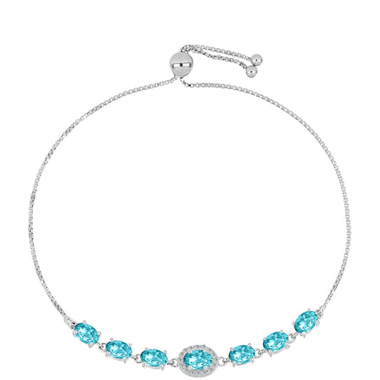 Silberarmband mit Paraiba Quarz und weißem Topas