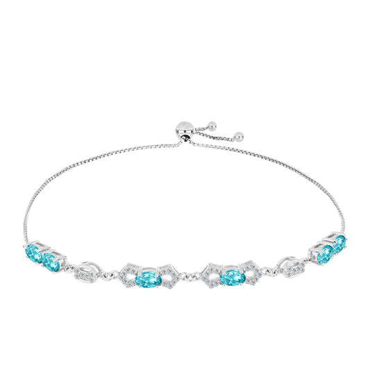 Silberarmband mit Paraiba Quarz und weißem Topas