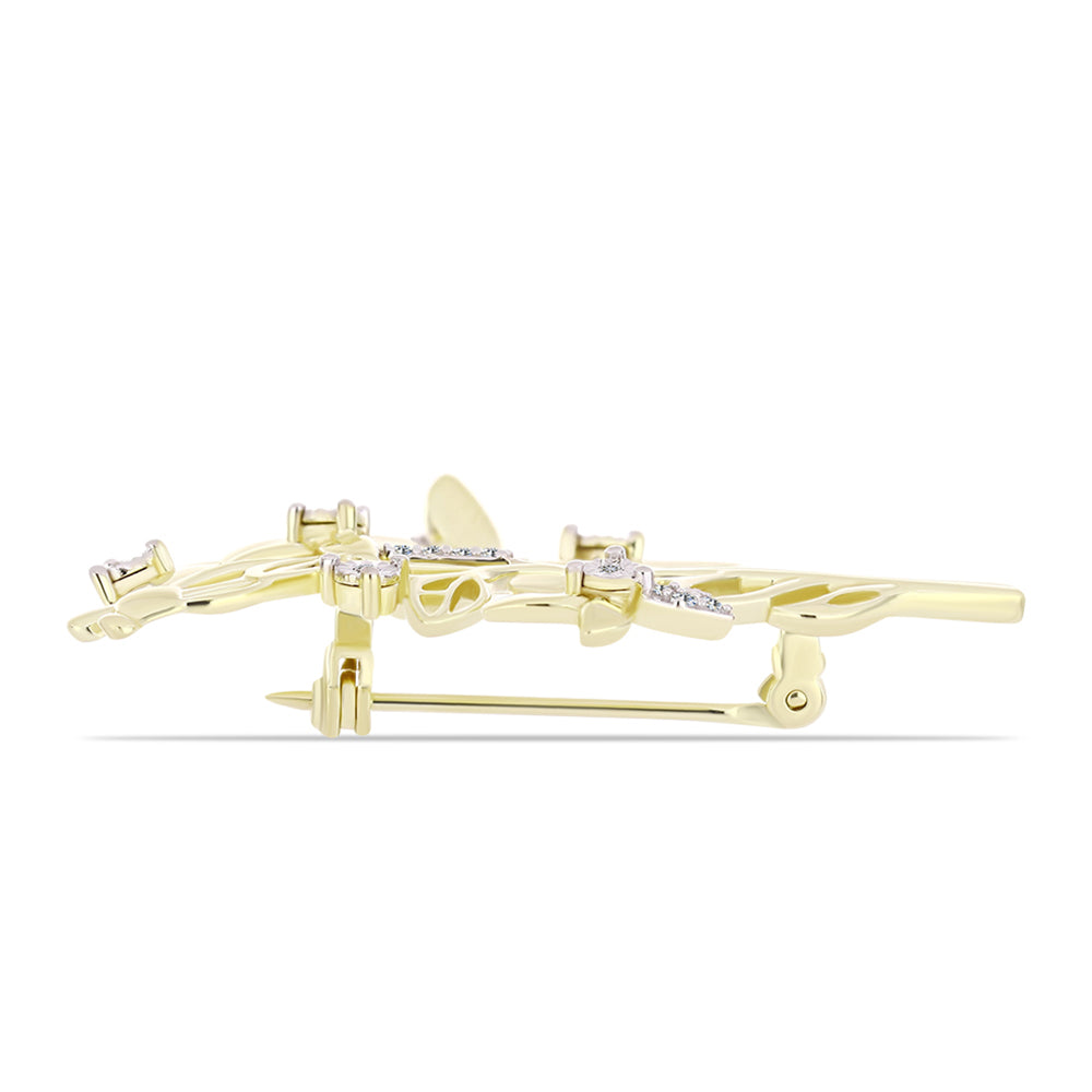 Goldplattierte Silberbrosche mit weißem Diamant und weißem Topas