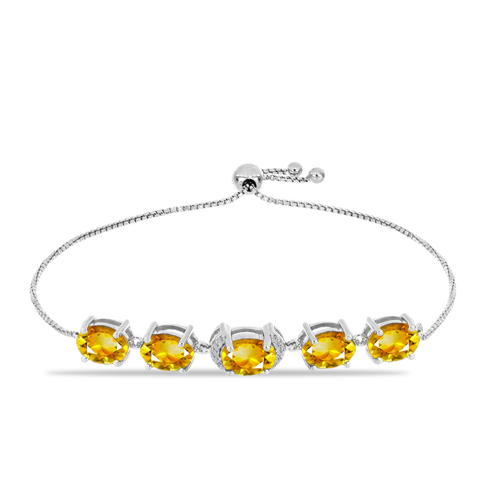 Silberarmband mit goldfarbenem Rio Zitrin und weißem Topas