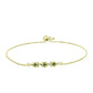 Goldplattiertes Silberarmband mit grünem Saphir und weißem Topas