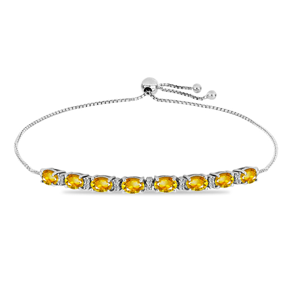 Silberarmband mit goldfarbenem Rio Zitrin und weißem Topas 1 