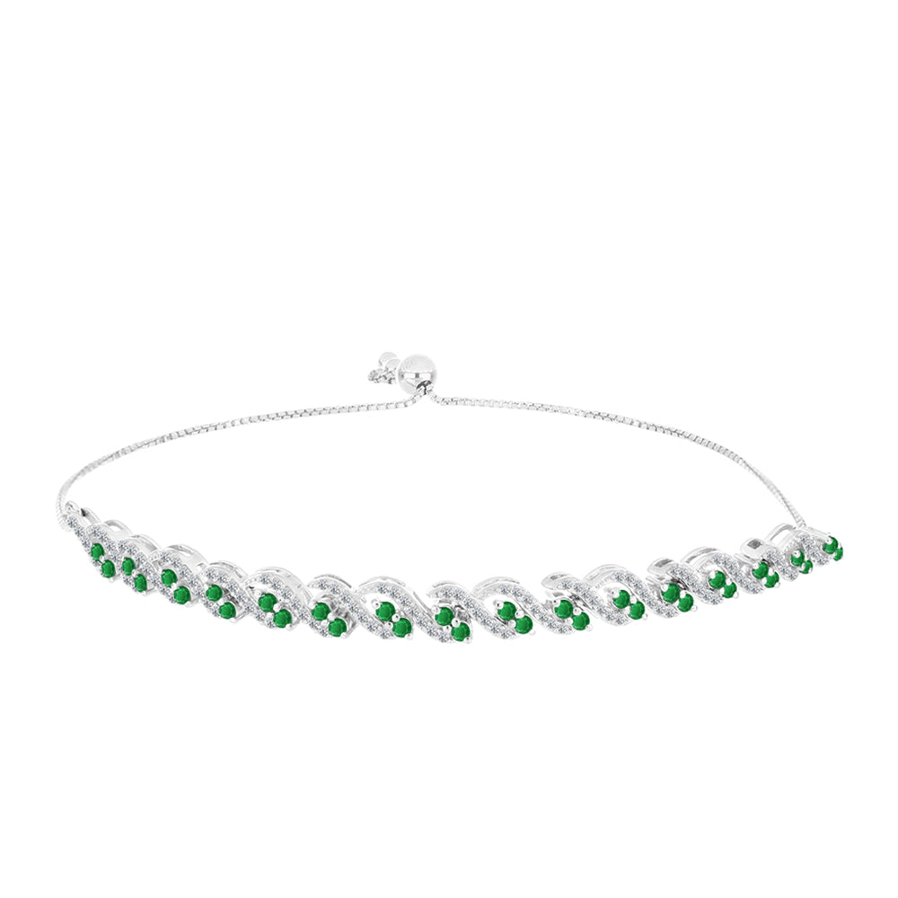 Silberarmband mit sambischem Smaragd und weißem Topas