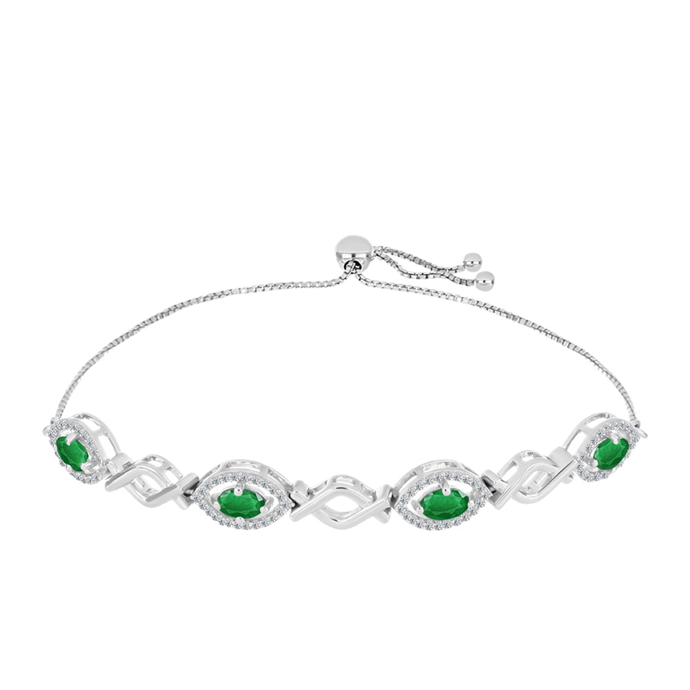 Silberarmband mit sambischem Smaragd und weißem Topas