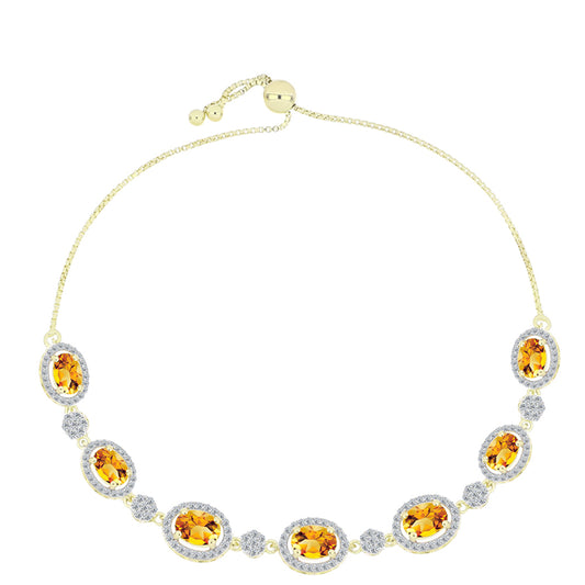 Goldplattiertes Silberarmband mit goldfarbenem Rio Zitrin und weißem Topas