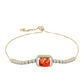Goldplattiertes Silberarmband mit Mohave-Türkis und weißem Topas