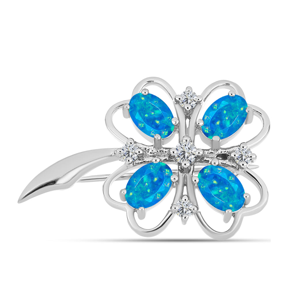 Silberbrosche mit äthiopischem Paraiba-Blauopal und weißem Topas