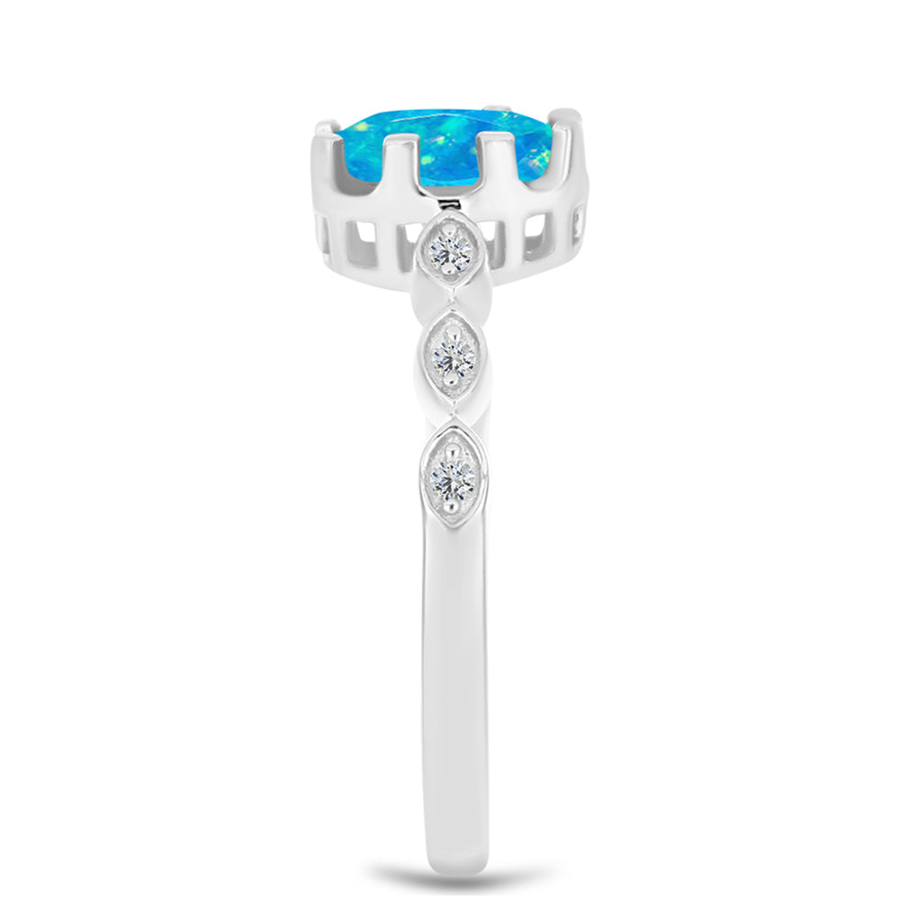 Silberring mit äthiopischem Paraiba-Blauopal und weißem Topas