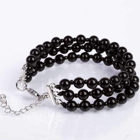 Armband aus goldplattiertesr Legierung mit schwarzem Onyx