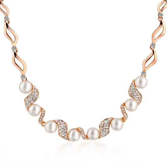 Halskette aus goldplattierter Legierung mit Perle und weißem Emporia® Kristall