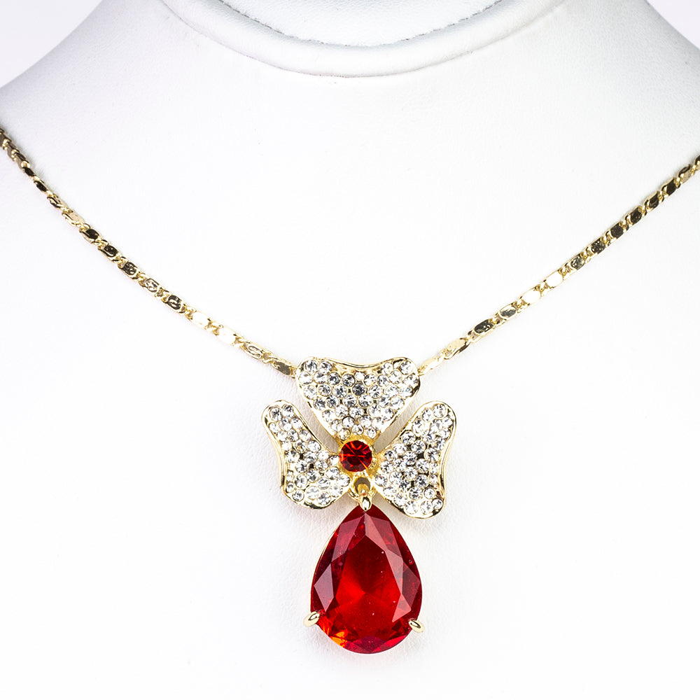 Ohrringe aus goldplattierter Legierung mit rotem Emporia®-Kristall 7 