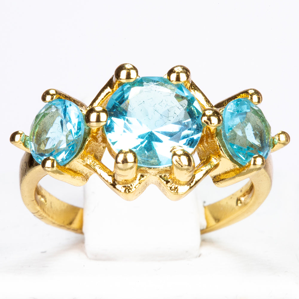Ring aus goldplattierterr Legierung mit blauem Emporia®-Kristall