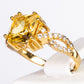 Ring aus goldplattierterr Legierung mit gelbem Emporia®-Kristall