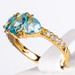 Ring aus goldplattierterr Legierung mit blauem Emporia®-Kristall