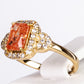 Ring aus goldplattierterr Legierung mit orangefarbenem Emporia® Kristall und weißem Emporia® Kristall