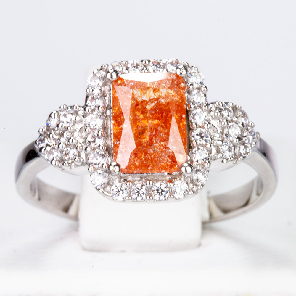Ring aus goldplattierterr Legierung mit orangefarbenem Emporia® Kristall und weißem Emporia® Kristall