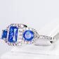 Ring aus goldplattierterr Legierung mit blauem Emporia®-Kristall und weißem Emporia® Kristall