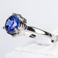 Ring aus goldplattierterr Legierung mit blauem Emporia®-Kristall