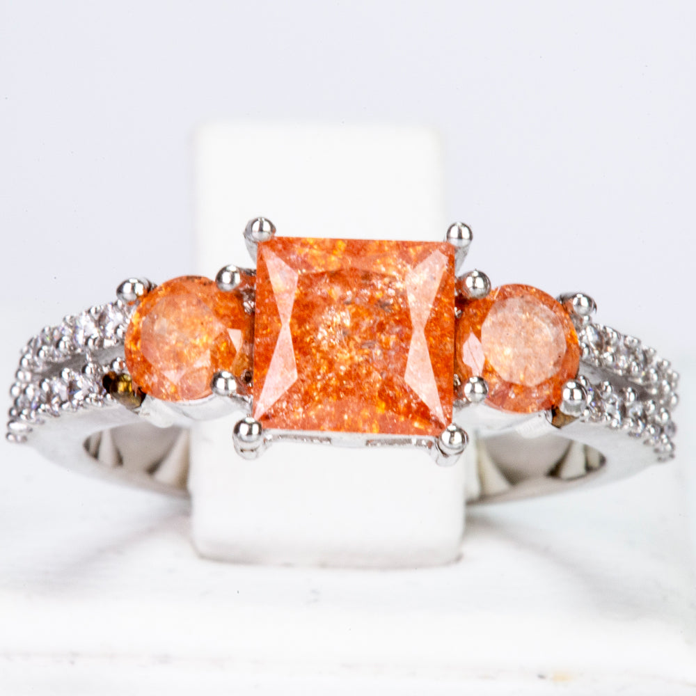Ring aus goldplattierterr Legierung mit orangefarbenem Emporia® Kristall und weißem Emporia® Kristall 1 