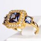 Ring aus goldplattierterr Legierung mit blauem Emporia®-Kristall und weißem Emporia® Kristall