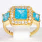 Ring aus goldplattierterr Legierung mit blauem Emporia®-Kristall und weißem Emporia® Kristall