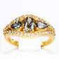 Ring aus goldplattierterr Legierung mit grünem Emporia® Kristall und weißem Emporia® Kristall