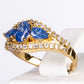 Ring aus goldplattierterr Legierung mit blauem Emporia®-Kristall und weißem Emporia® Kristall