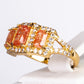 Ring aus goldplattierterr Legierung mit orangefarbenem Emporia® Kristall und weißem Emporia® Kristall
