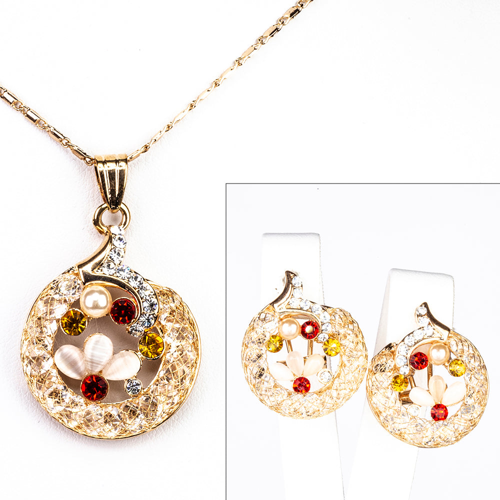 Schmuckgarnitur aus aus goldplattierter Legierung mit rotem Emporia®-Kristall und weißem Emporia® Kristall