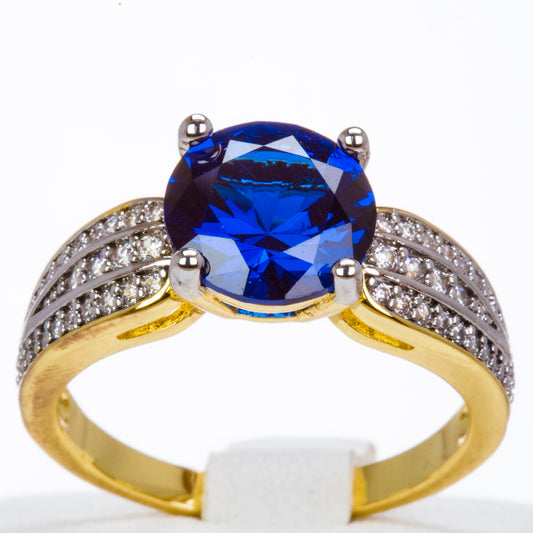 Ring aus goldplattierterr Legierung mit blauem Emporia®-Kristall und weißem Emporia® Kristall
