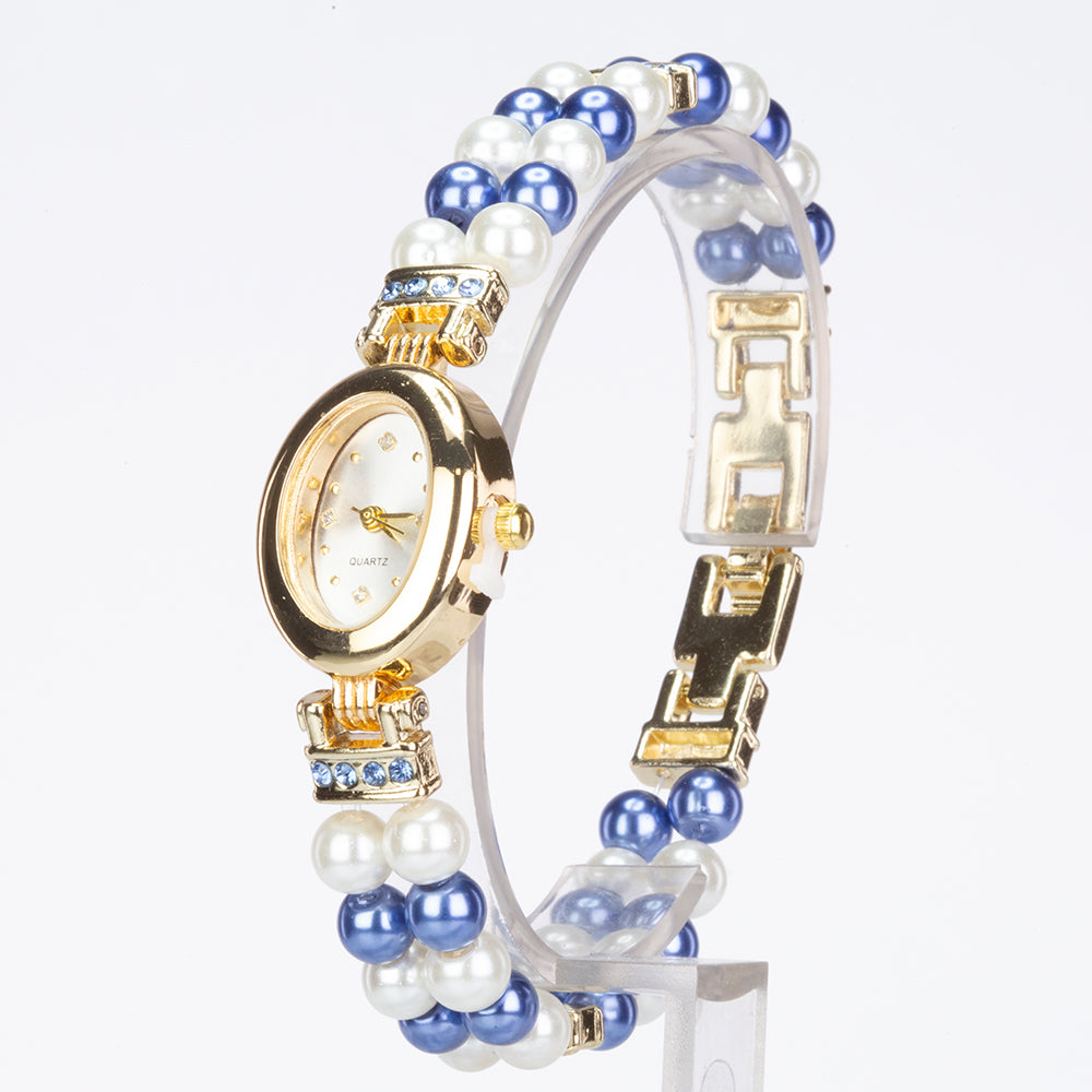 Schmuckgarnitur aus aus goldplattierter Legierung mit weißer Perle und blauem Emporia®-Kristall 7 