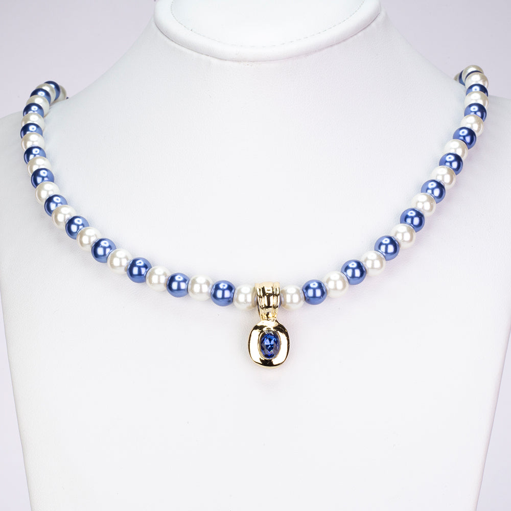Schmuckgarnitur aus aus goldplattierter Legierung mit weißer Perle und blauem Emporia®-Kristall