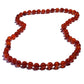 Schmuckgarnitur aus künstlicher Perle mit rotem Onyx