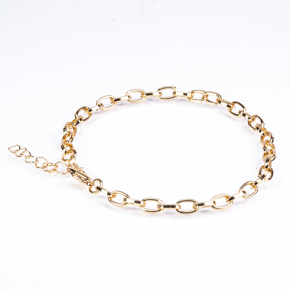 Schmuckgarnitur aus aus goldplattierter Legierung mit Emaille und grünem Emporia® Kristall 7 