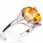 Silberring mit Padparadscha Quarz und weißem Topas