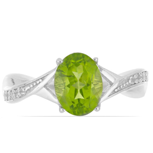 Silberring mit Peridot aus Changbai und weißem Topas