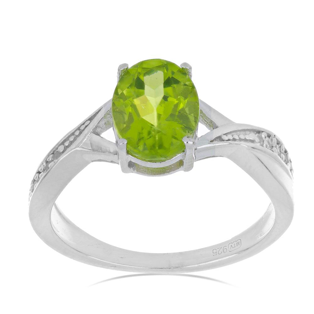 Silberring mit Peridot aus Changbai und weißem Topas
