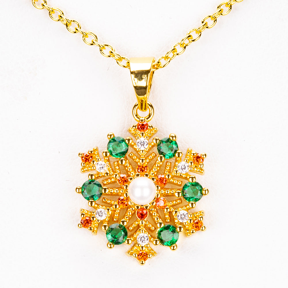 Schmuckgarnitur aus aus goldplattierter Legierung mit rotem Emporia®-Kristall und grünem Emporia® Kristall